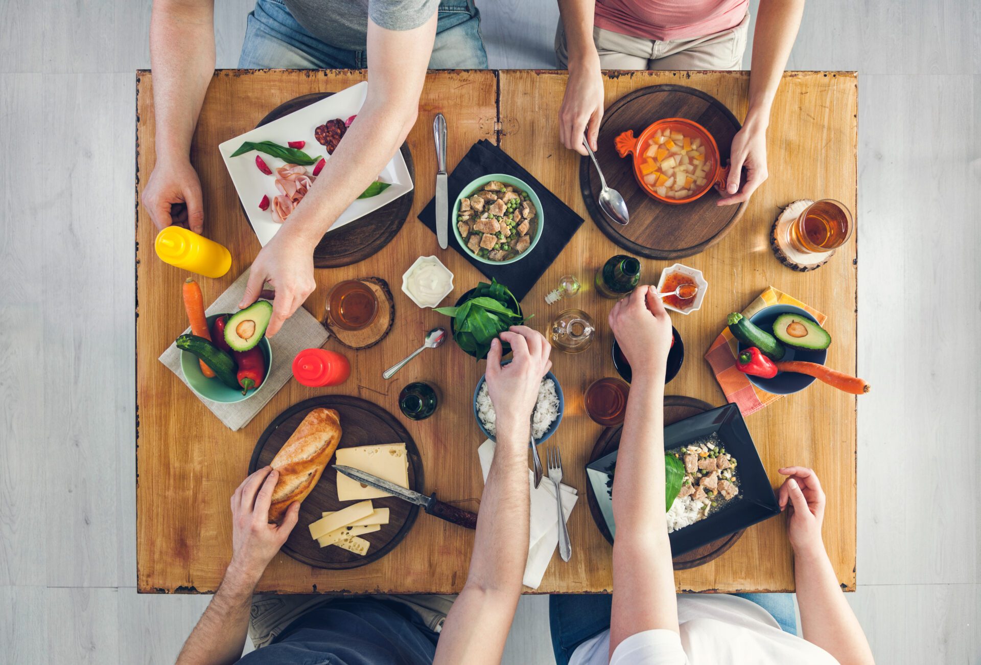 Top view, Group of people sitting at the table having meal